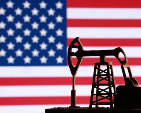 US oil companies see big profit jump, gird for clash over pump prices with Trump