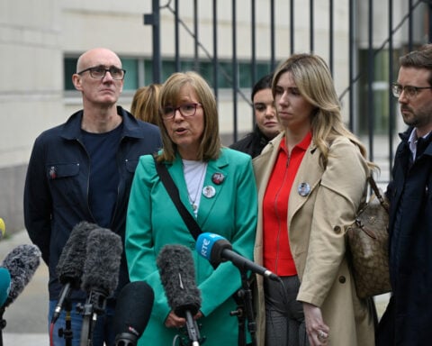 3 men acquitted in killing of journalist shot while covering Northern Ireland protest