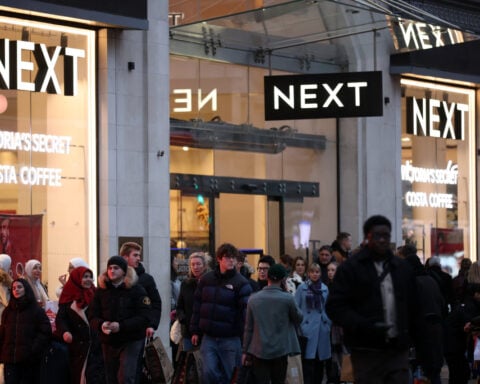 UK's Next plans takeover bid for Harvey Nichols, Sky News reports