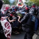 Far-right Alternative for Germany party re-elects leaders as protesters and police clash