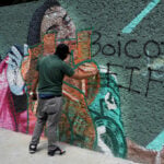 Soccer-Mexicans balance World Cup joy with worries over domestic issues