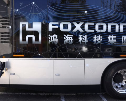 Foxconn second-quarter revenue jumps, company cautions on geopolitics