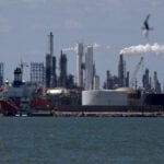 Oil slips after OPEC+ agrees to raise output targets