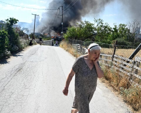 Wildfires rage in Portugal, Greece and Spain while Greek authorities warn of toxic smoke