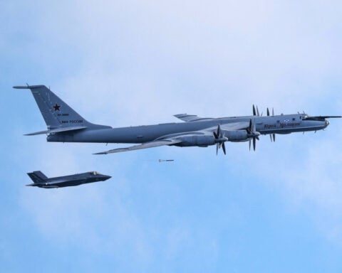 UK says aircraft carrier approached by Russian plane in Norwegian Sea