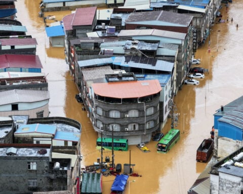 Flooding kills two in China's Nanning as east braces for super typhoon