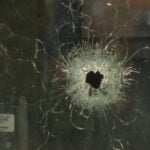 Two men killed, nine injured in Orchard Cafe parking lot shooting