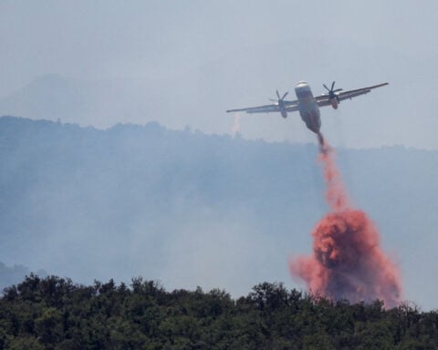 Wildfire in southern France forces 10,000 people from their homes