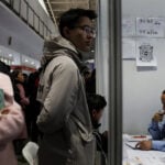 China's booming gig economy masks job market pain, strains welfare system