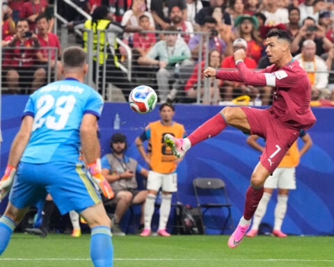 A stoic Cristiano Ronaldo exits last World Cup with 'clear conscience' after Portugal loses to Spain