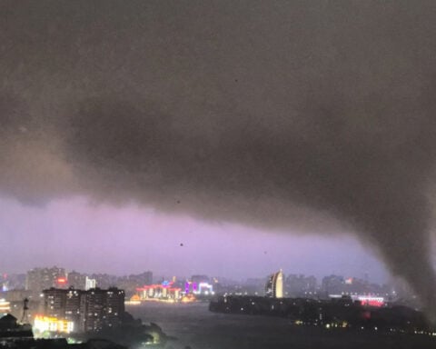 Tornadoes wreak havoc across central China as Typhoon Bavi looms offshore