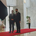 Explosions rock Damascus as French President Macron visits Syria