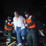 Man blown from 12th-floor apartment as deadly tornado rips through central China