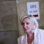 French court shortens Le Pen's ban from office but orders electronic tag