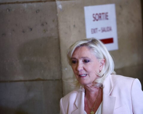 French court shortens Le Pen's ban from office but orders electronic tag