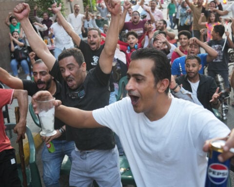 A Cairo coffee house erupts, then goes silent as Egypt’s World Cup run meets Argentina