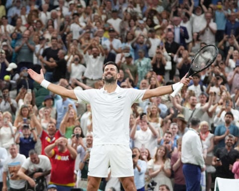 Djokovic outlasts Auger-Aliassime after more than 5 hours to reach Wimbledon semifinals at age 39