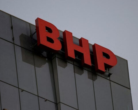 BHP iron ore workers threaten first strike in decades at Port Hedland