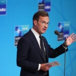 The Latest: Danish prime minister vows to defend Greenland during NATO summit in Turkey