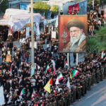 Thousands march as Khamenei's funeral procession crosses into Iraq