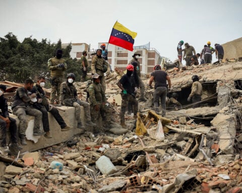 Families desperately search for news of loved ones after devastating Venezuela earthquakes