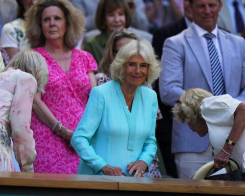 Queen Camilla visits Wimbledon and is joined by actor who played her husband
