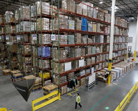 US wholesale inventories in May revised lower