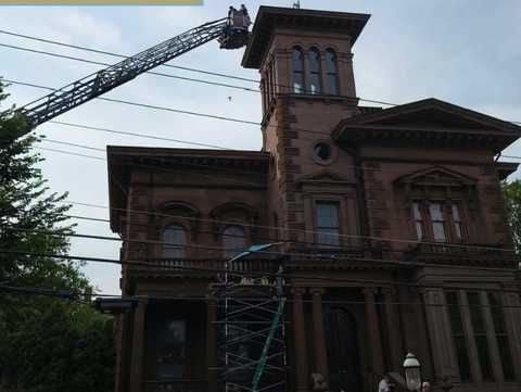 Crews trying to rescue seagull that is stuck on the roof of Portland's Victoria Mansion