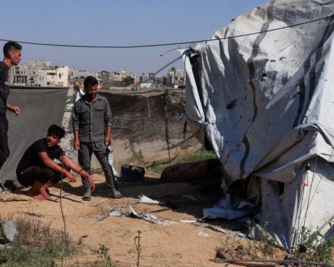 Israeli fire kills nine people, including two children, in Gaza, medics say