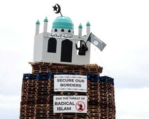 Replica of mosque set alight on Northern Ireland bonfire