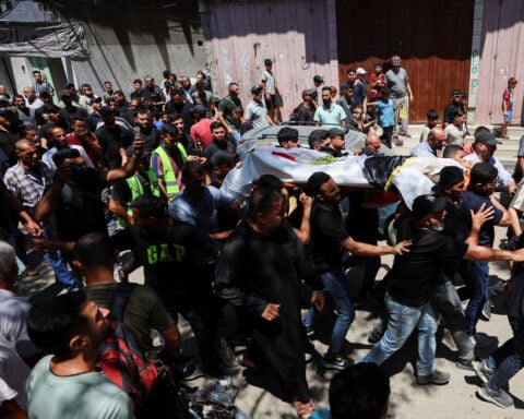 Gazans mourn aid worker killed by Israel who brought them the World Cup