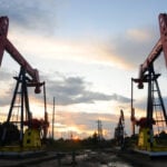 Oil edges lower, but heads for weekly gain as Middle East supply risks persist