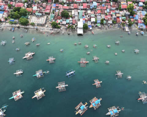 A decade after historic ruling, Philippine fishermen say driven away from disputed shoal by China