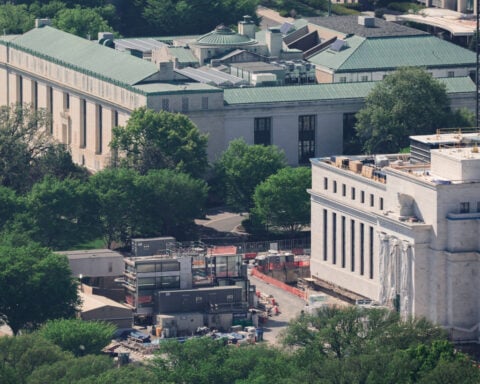Fed officials fret over inflation risk, weigh rate hikes