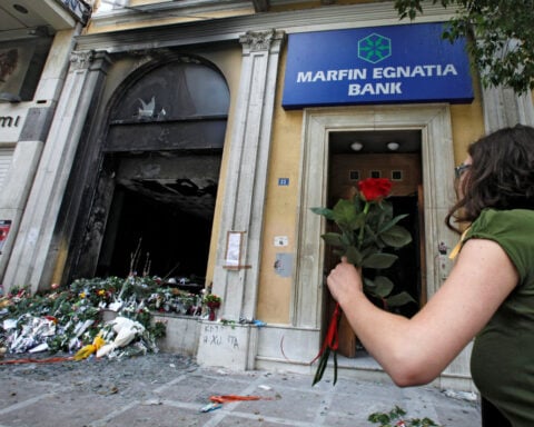 Greece arrests two over deadly 2010 protest fire-bombing