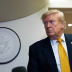 The Latest: 8 men indicted in planned attack on White House UFC cage-fighting show