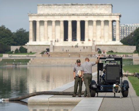 Crews are draining the Lincoln Memorial Reflecting Pool again as part of Trump's troubled revamp