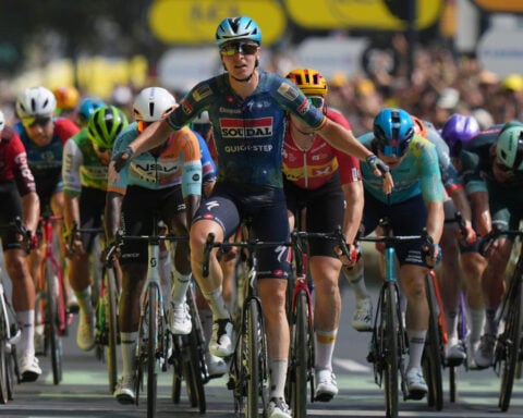 Belgian rider Merlier wins stage 7 as Tour favorite Pogacar keeps the yellow jersey