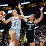 WNBA regular-season record crowd of 20,996 watches Wings beat Tempo in Montreal