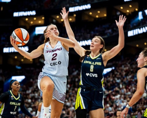WNBA regular-season record crowd of 20,996 watches Wings beat Tempo in Montreal