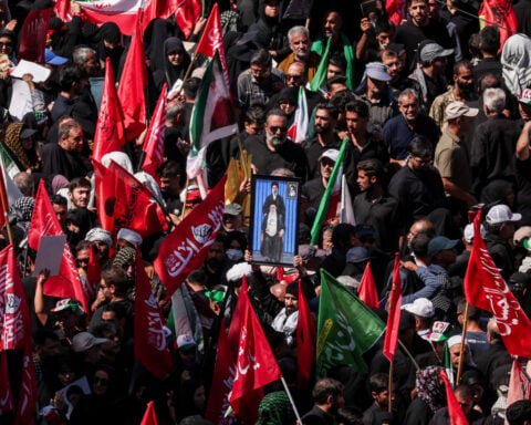 Iran's supreme leader pledges revenge for slain father and predecessor
