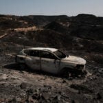 Hundreds of firefighters battle wildfire in southern Spain that killed at least 12