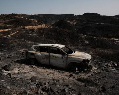Hundreds of firefighters battle wildfire in southern Spain that killed at least 12