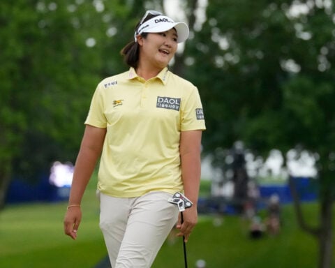 Haeran Ryu sets an LPGA major record with a 60 to build a 3-shot lead at the Evian Championship