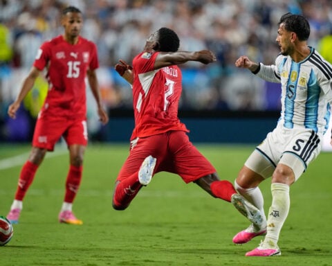 Argentina and Switzerland head to extra time with World Cup quarterfinal tied at 1-1