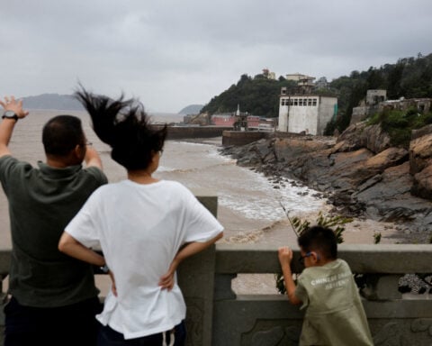 Typhoon Bavi batters eastern China, threatens days of heavy rain