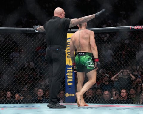 McGregor outlines plan for surgery, rehab and another fight following knee injury against Holloway