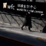 China tells some banks not to re-discount bills at rates below 0.5%, sources say