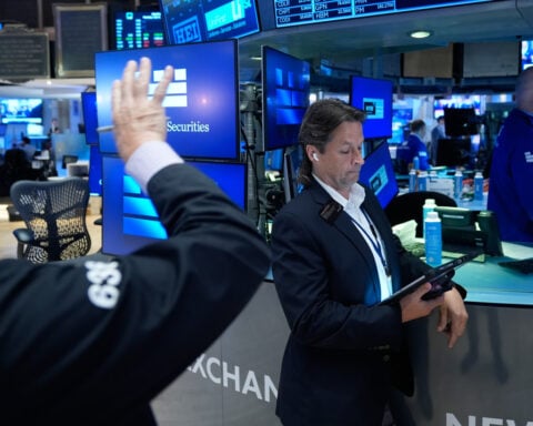US stocks rise after data shows slowing inflation, even as IBM plunges