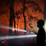 Blaze near Paris burns on as Europe heats up